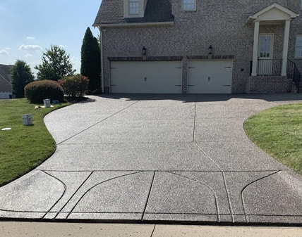 pressure washed driveway in front of a home in nashville 